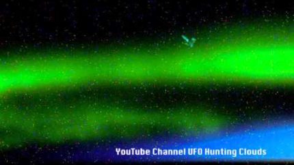 UFO Captured Flying Through The Aurora Borealis or Northern Lights