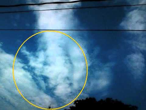The face of our LORD, JESUS CHRIST, appears again thru the clouds!!!! REAL 2011 MIRACLE!